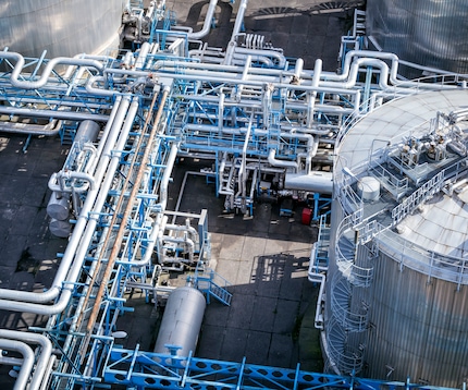 Aerial view of steel pipeline network at an industrial plant