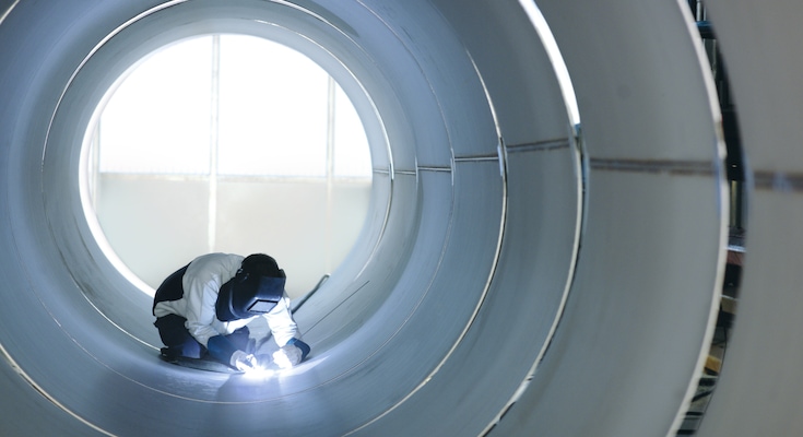 Welder welding stainless steel