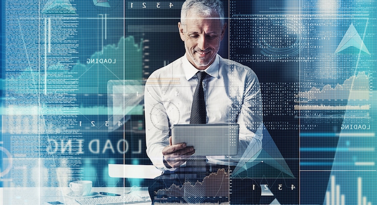 Businessman looking at a tablet computer