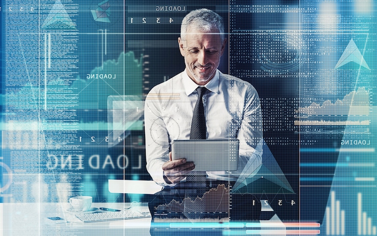 Businessman looking at a tablet computer