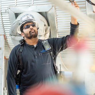 Engineers walking across the plant