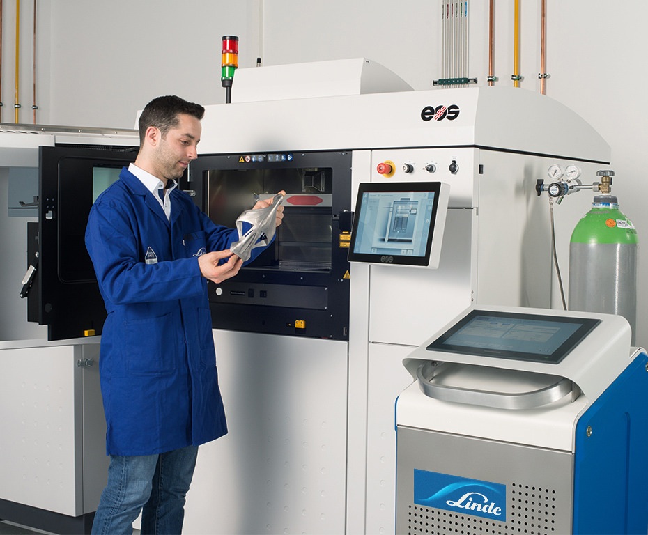 ADDvance Oxygen precision box with EOS 3D printer and employee