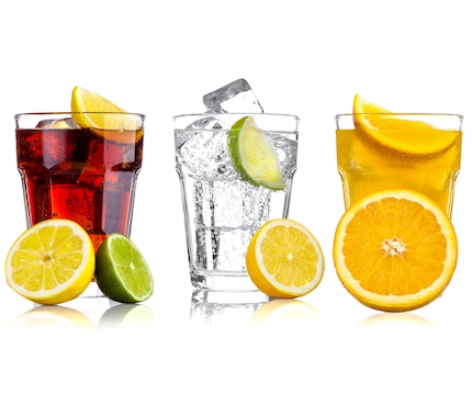 Glasses filled with a variety of sodas - different flavors