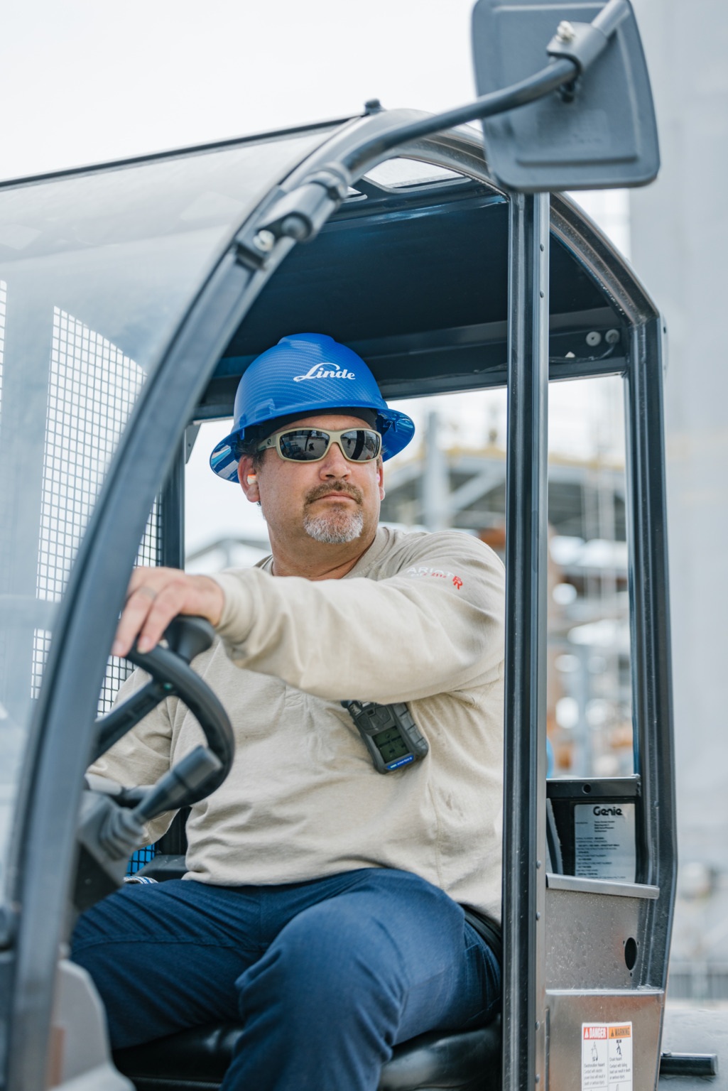 Forklift operator accessing a clear path around the area