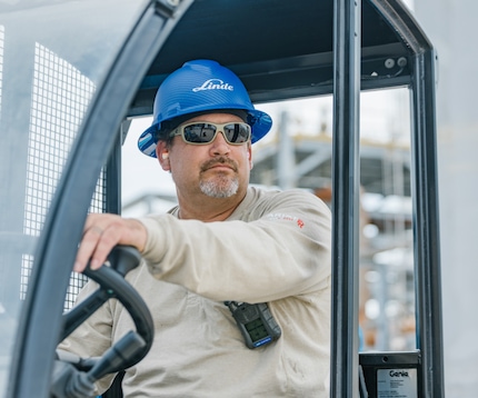 Forklift operator accessing a clear path around the area