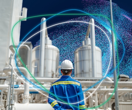 A Data cloud superimposed on an industrial plant with large gas cylinders